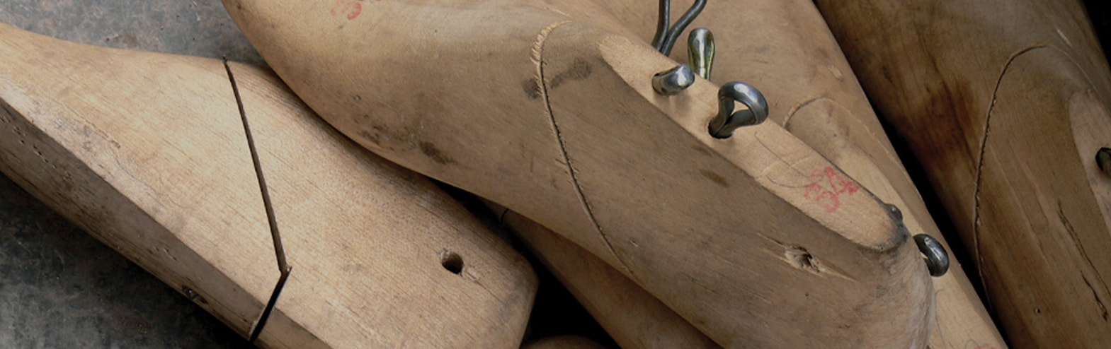 Sustainability. The featured image includes wooden shoe trees.